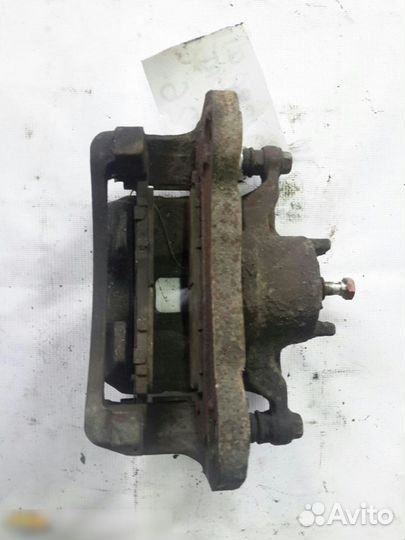 Суппорт передний левый Mitsubishi Pajero Montero S