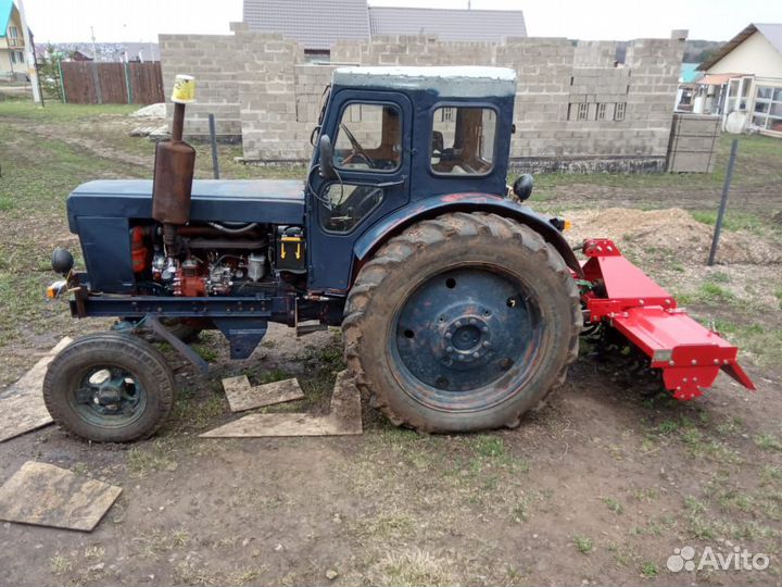 Вспашка земли плугом и фрезой