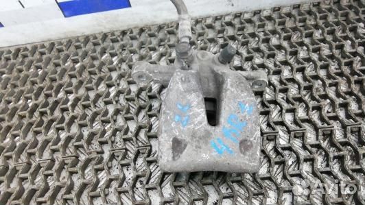 Суппорт тормозной задний левый toyota avensis T25