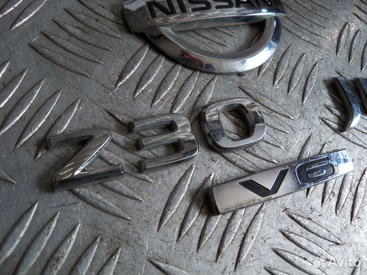 Эмблема крышки багажника Nissan Teana J31 2007г