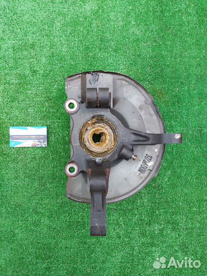 Кулак поворотный левый Mitsubishi Lancer X