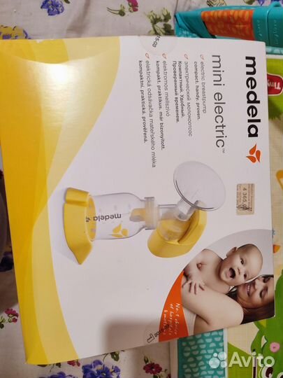 Молокоотсос medela электрический