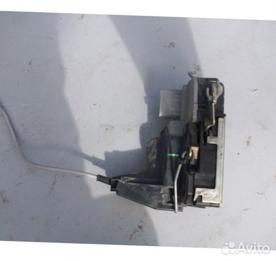 Замок двери передней левой Mazda CX - 7 (ER)