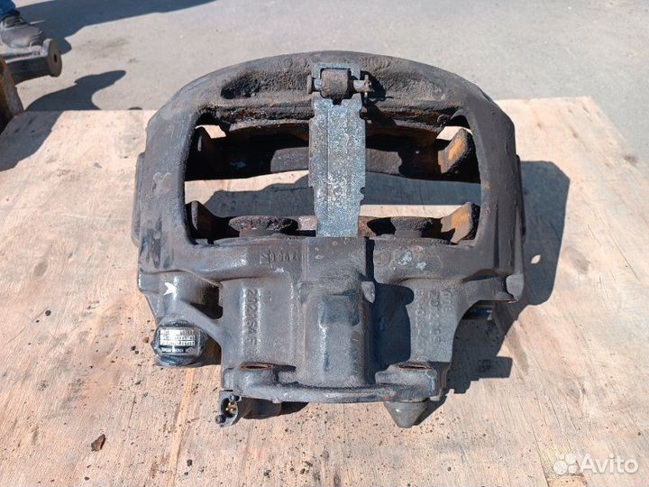 Суппорт тормозной левый Man Tgx