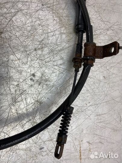 Трос стояночного тормоза левый Hyundai Sonata Nf