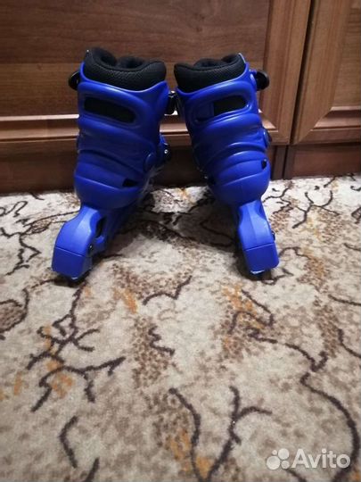 Роликовые коньки