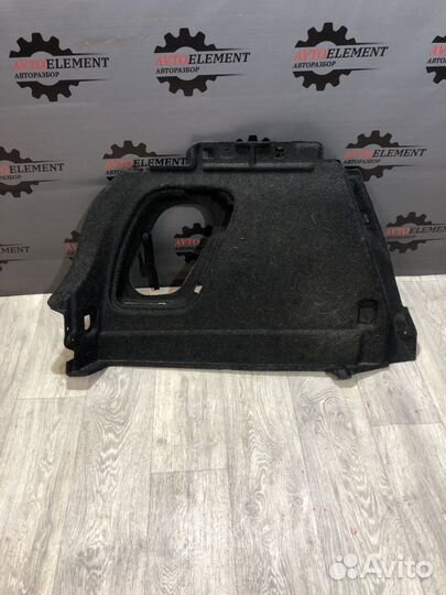 Обшивка багажника левая Мазда 3 BL хэтчбек