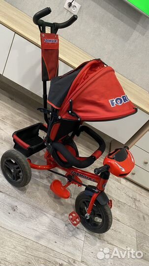 Трехколесный велосипед с ручкой