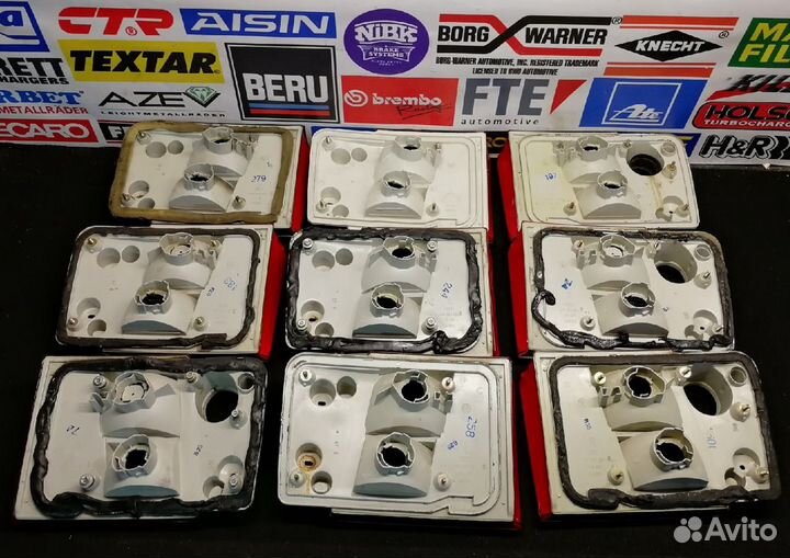 Фонари задние audi А6C4 hella в крышку багажника