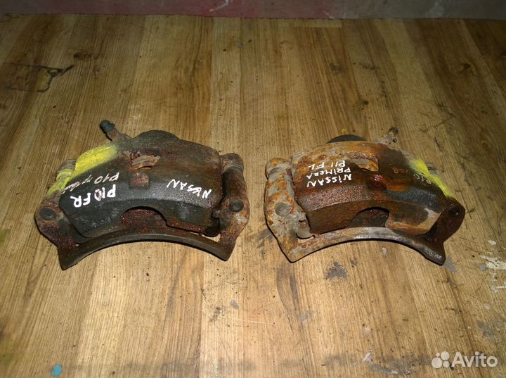 Суппорт передний левый правый nissan primera p10