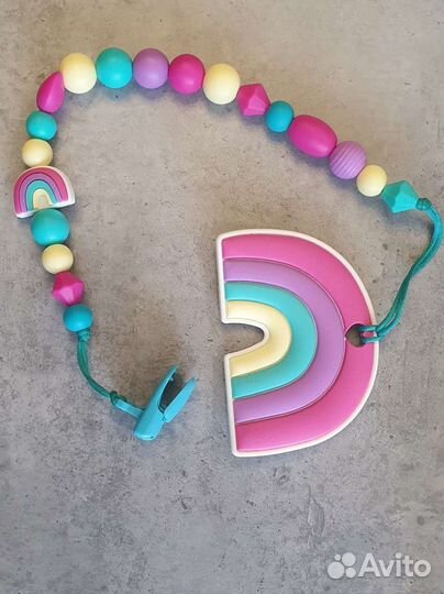 Прорезыватель-держатель