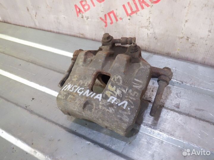 Суппорт тормозной передний левый Опель Инсигния