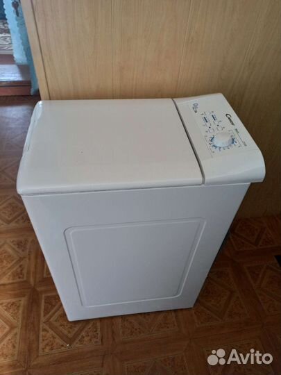Стиральная машина с вертикальной загрузкой Candy