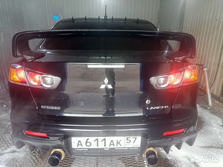 Задний бампер lancer 10 с эво накладкой