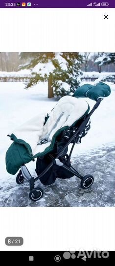 Зимний меховой конверт в коляску