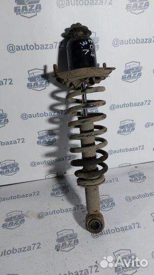 Стойка подвески задняя левая Geely Emgrand Ec7