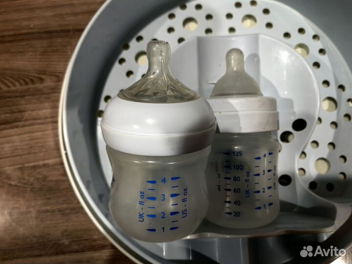 Стерилизатор и бутылочки для кормления