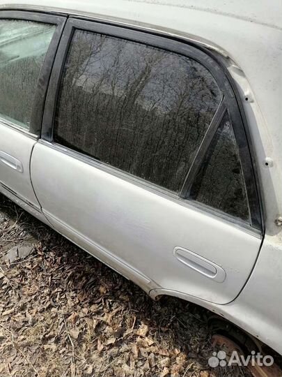 Дверь Toyota corolla