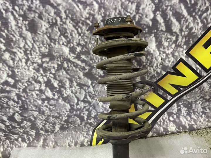 Амортизатор передний левый Hyundai Accent Акцент