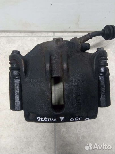Суппорт тормозной передний левый Renault Scenic 2