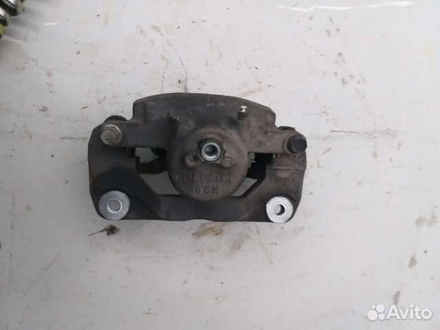 Суппорт тормозной передний правый мазда 6gh