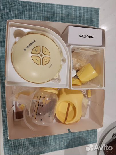 Молокоотсос medela swing электрический