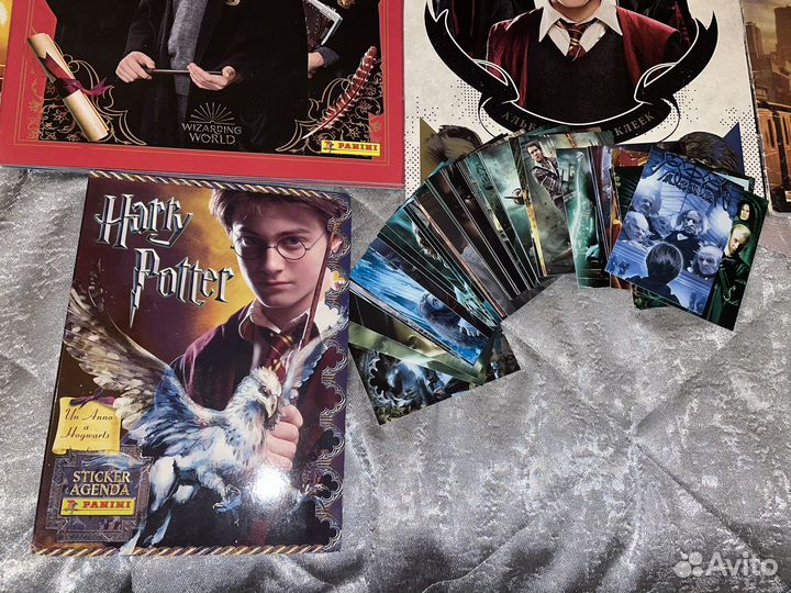 Заполненные альбомы Гарри Поттер и твари Роулинг