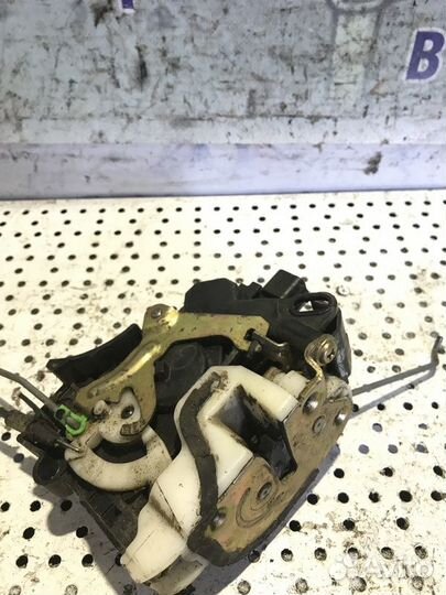 Замок двери передний левый Mitsubishi Lancer 9 1.6