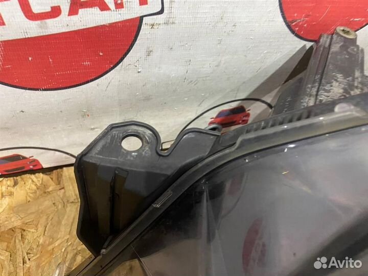 Фара левая Opel Astra H GTC