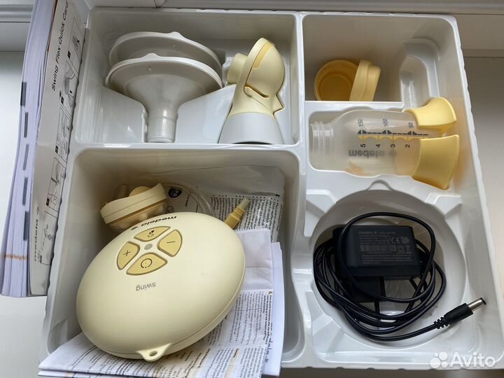 Молокоотсос medela электрический