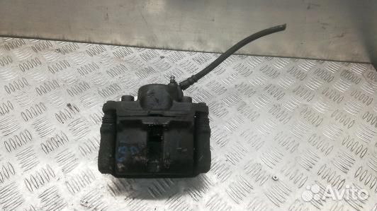 Суппорт тормозной передний левый dacia sandero 1