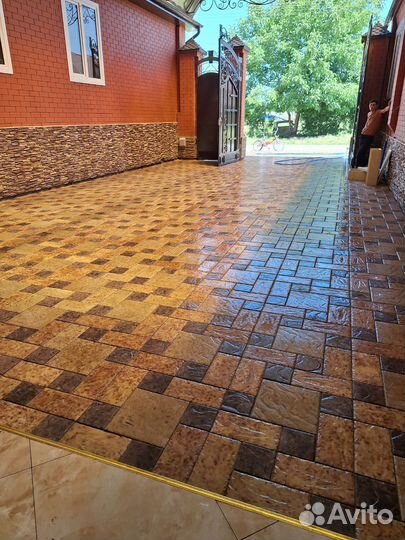 Укладка тротуарной плитки брусчатки