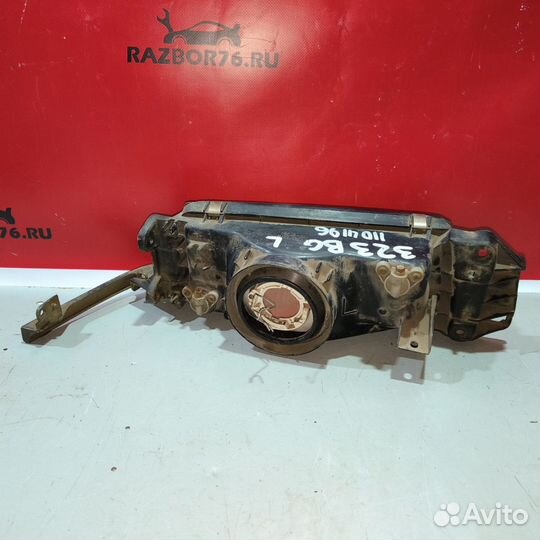 Фара левая Mazda 323 BG седан