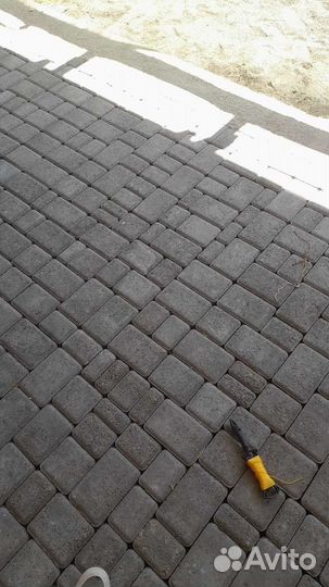 Укладка тротуарной плитки брусчатки