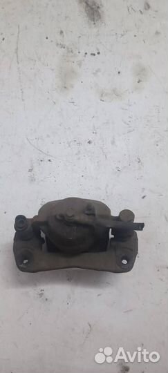 Суппорт передний правый Mazda 323 6 BJ