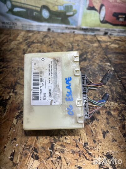 Блок центрзамка Мазда Трибьют EP