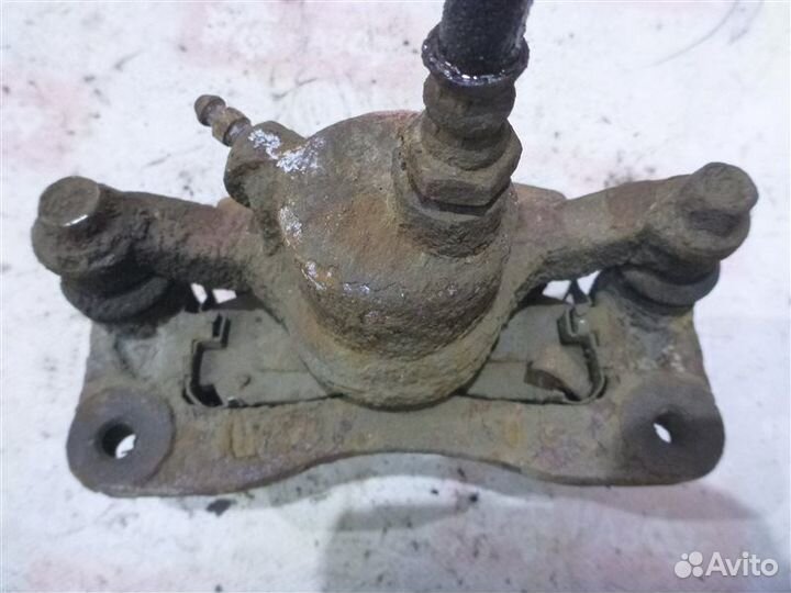 Суппорт задний левый Mitsubishi Galant E52A 1800