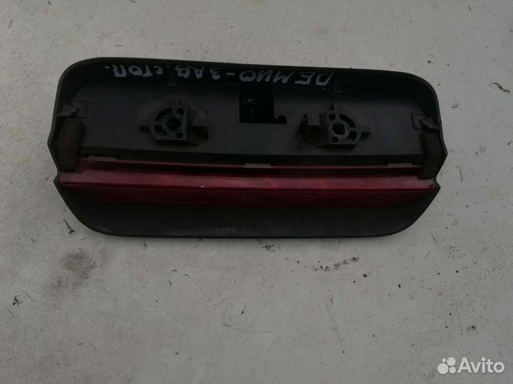 Фонарь стоп сигнал Мазда Демио 1