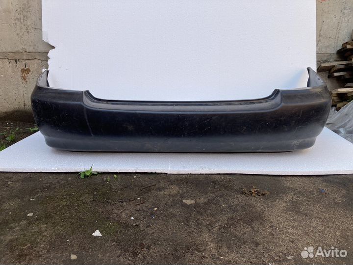 Бампер задний Toyota Carina 2003