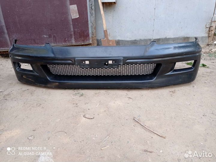 Бампер передний Mitsubishi Lancer cedia