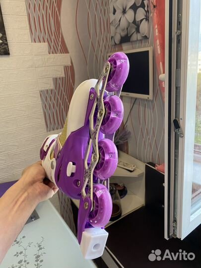 Роликовые коньки