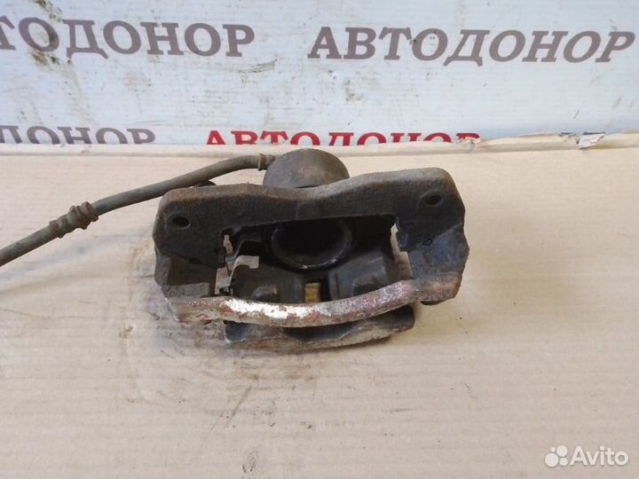 Суппорт тормозной передний левый Mazda 626 GF 2.0