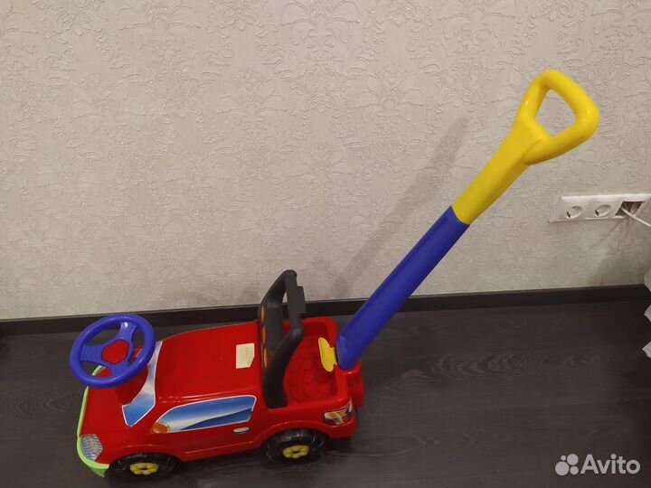 Машинка каталка с ручкой Полесье