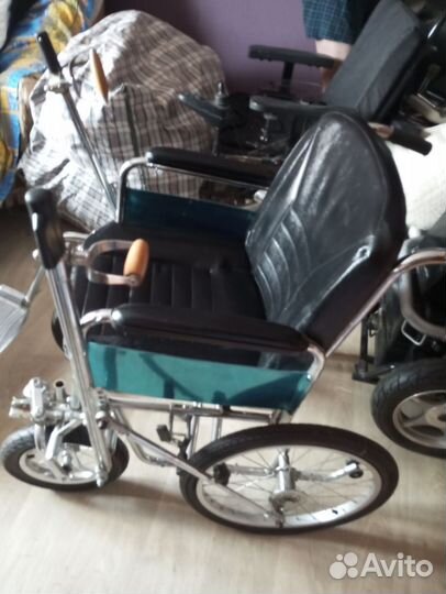Кресло коляска с ручным рычажным приводом