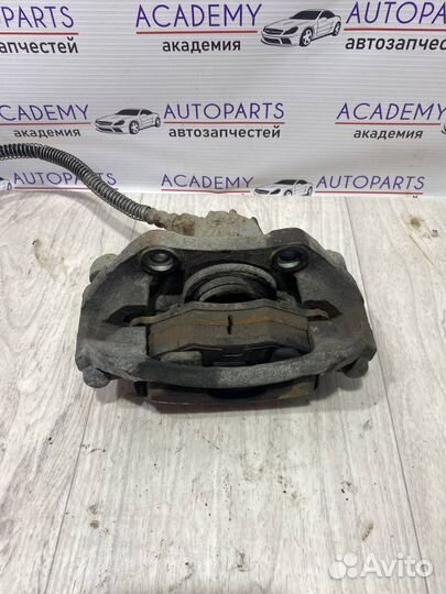 Суппорт тормозной передний левый Peugeot 206