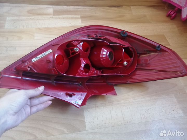 Фонарь задний левый опель корса д