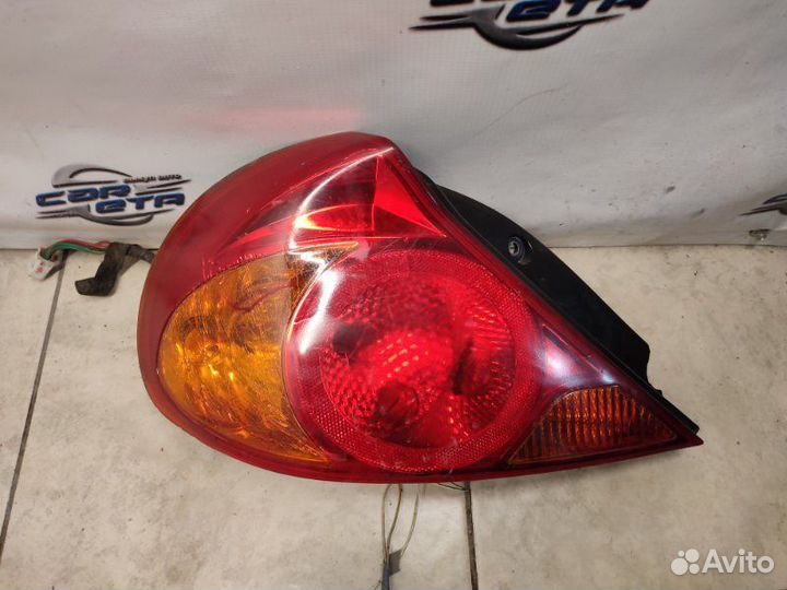 Фонарь задний задний левый Kia Spectra 1.6 S6D