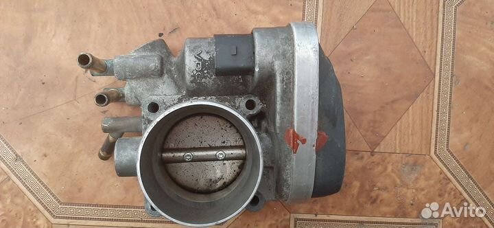 Дроссельная заслонка Volkswagen Golf 06a133062at