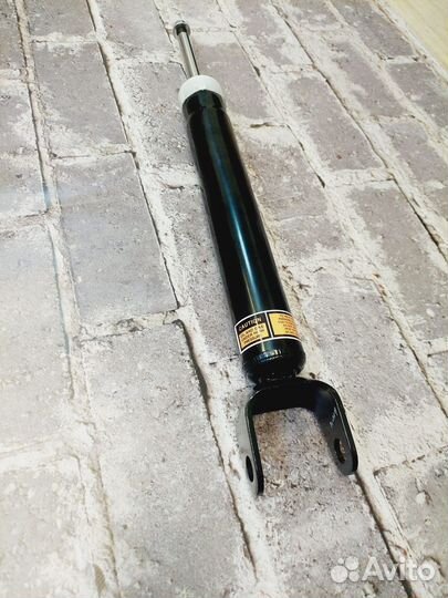 Grand cherokee амортизатор задний