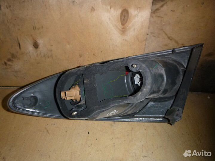 Фонарь задний наружный левый mazda (GG) 2002-2007